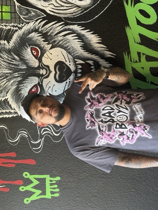Dinero, tattoo artist at House of Ink